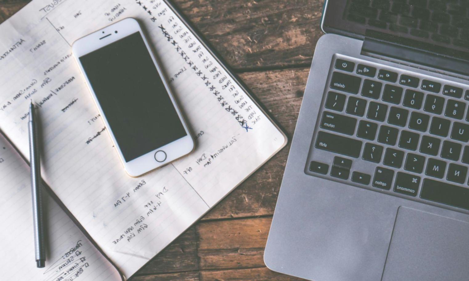 Financial planning session with documents and calculator on professional desk