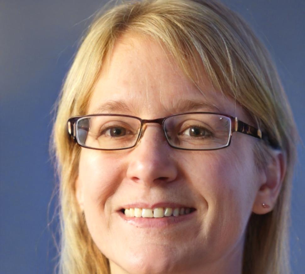 Professional headshot of female financial instructor